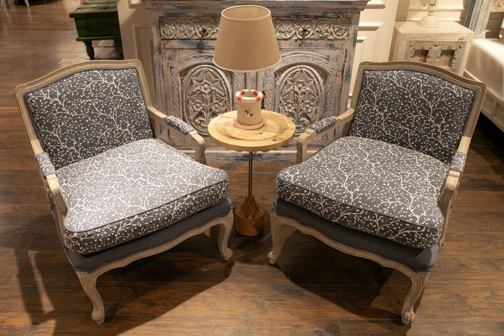Pair of upholstered accent chairs with side table in Central Ohio